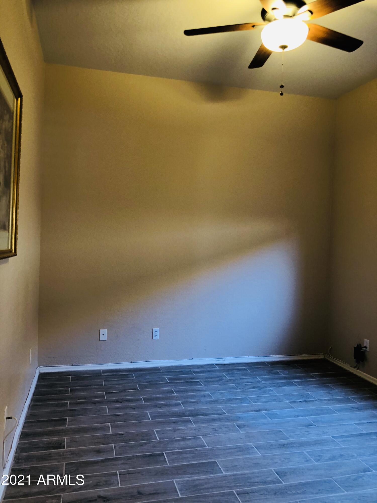 10453 East Pine Valley Drive Scottsdale, AZ 85255 - Photo 17 of 35 a view of an empty room