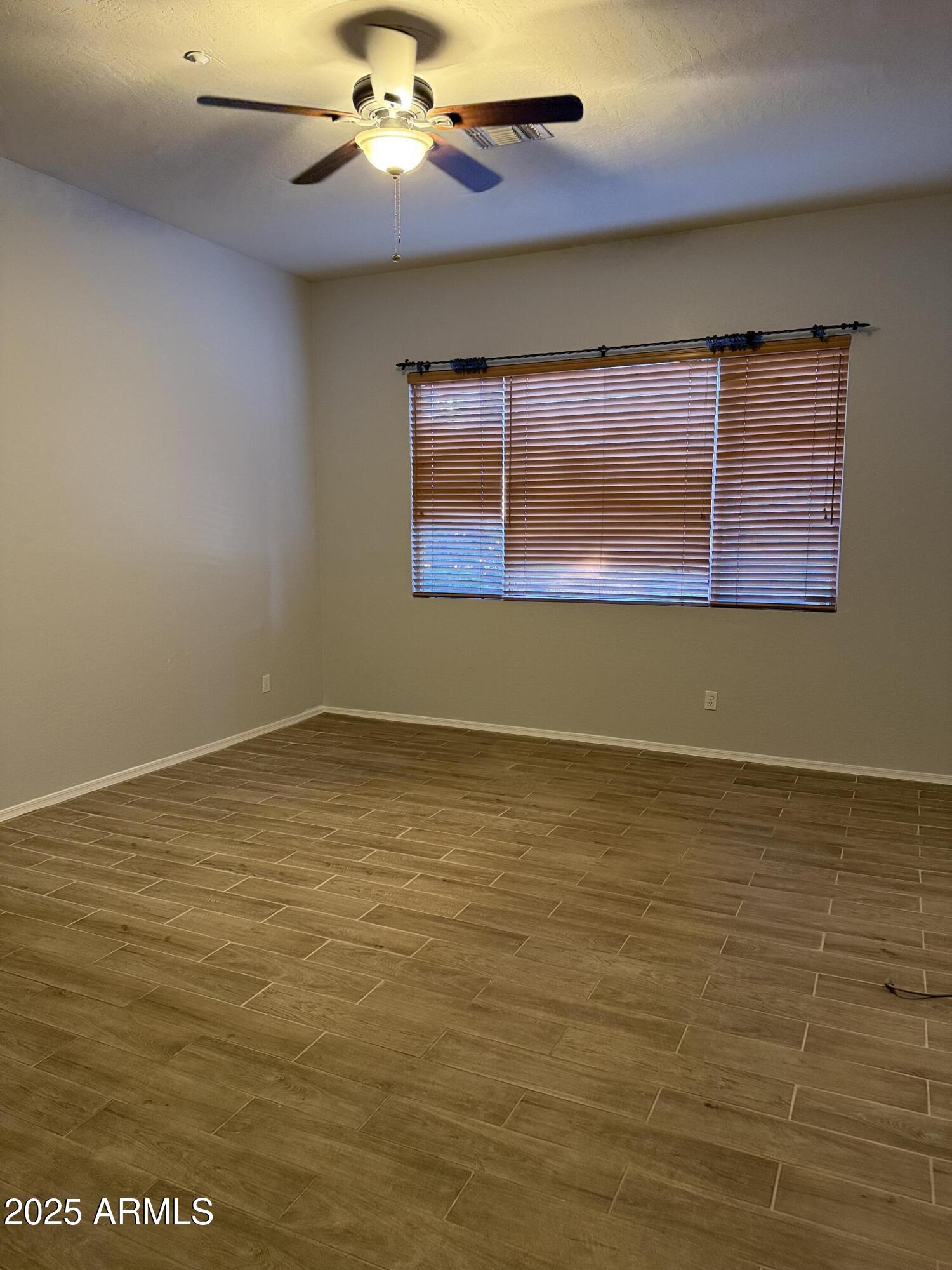 10453 East Pine Valley Drive Scottsdale, AZ 85255 - Photo 20 of 35 a view of an empty room with window