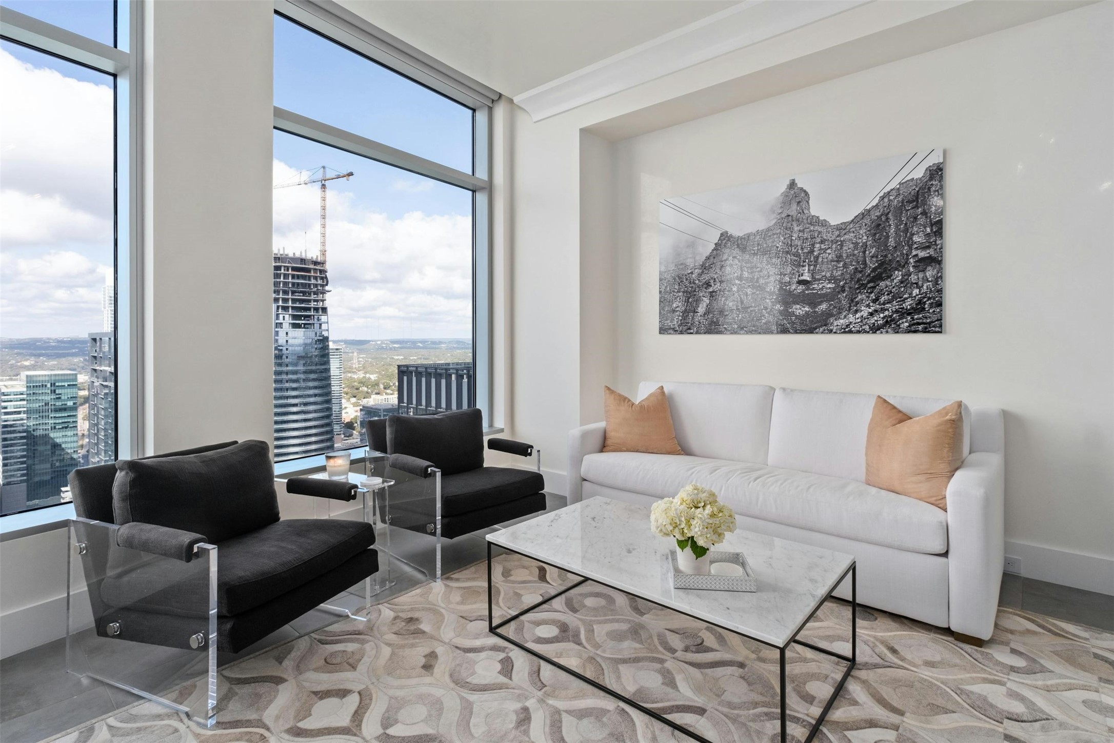 200 Congress Avenue, Unit 41Q Austin, TX 78701 - Photo 15 of 39 a living room with furniture and a large window