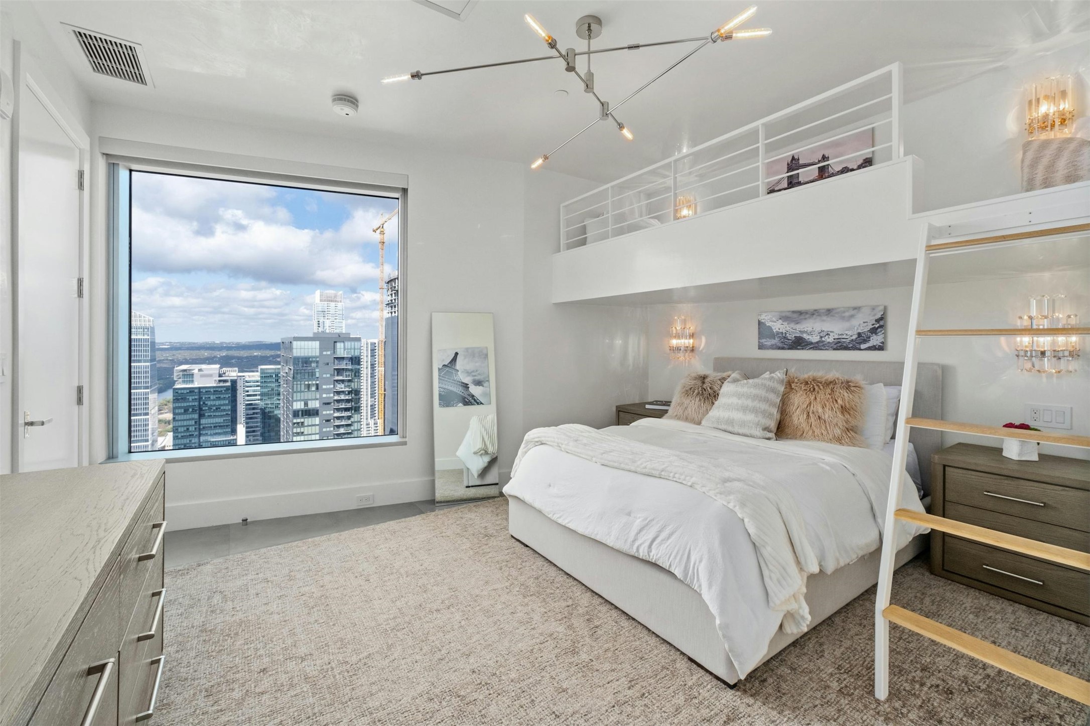 200 Congress Avenue, Unit 41Q Austin, TX 78701 - Photo 19 of 39 a bedroom with a large bed and a large window