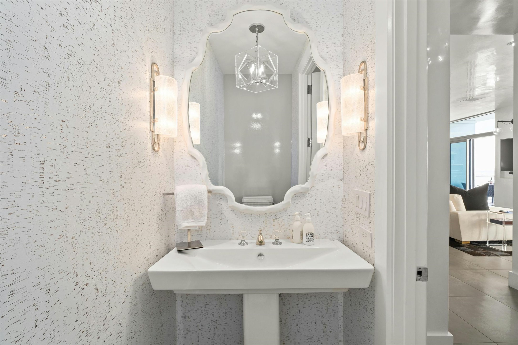 200 Congress Avenue, Unit 41Q Austin, TX 78701 - Photo 23 of 39 a view of a bathroom with a sink and mirror
