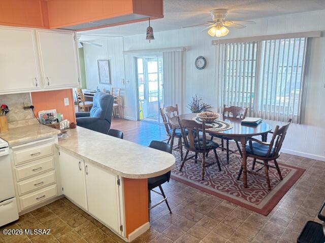5731 West Flying M Street Tucson, AZ 85713 - Photo 11 of 20 a view of a dining room with furniture