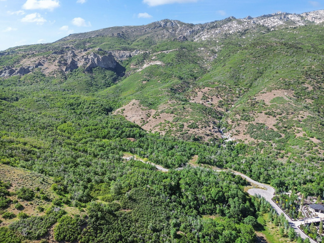 2601 North Mountain Pk Road, Unit 55 Alpine, UT 84004 - Photo 5 of 11 Expansive mountainous terrain featuring abundant green foliage and rugged rock formations