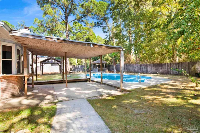 a view of a sitting area with a floor to ceiling window