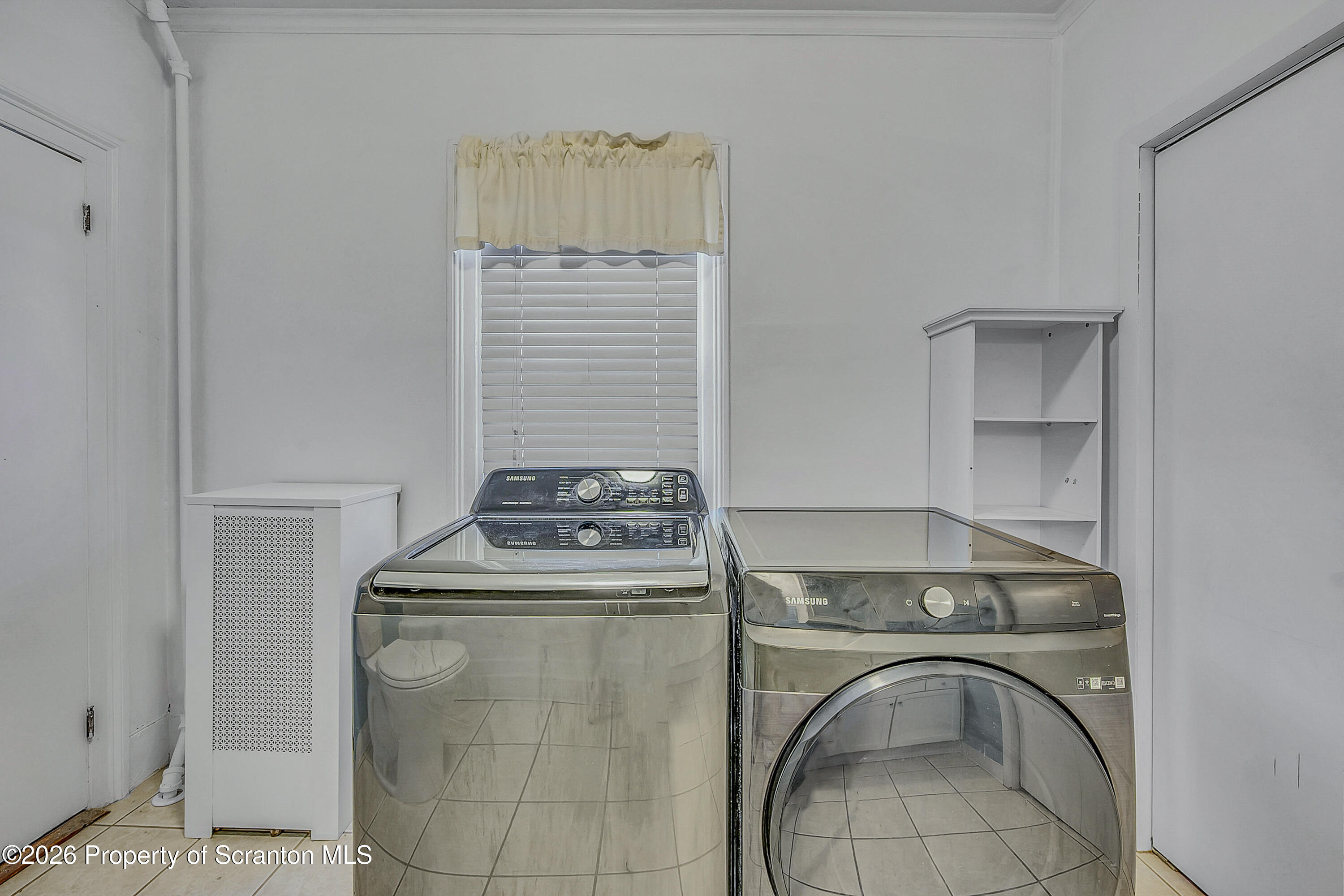 331 Cherry Street, Unit A Dunmore, PA 18512 - Photo 14 of 18 a utility room with dryer and washer