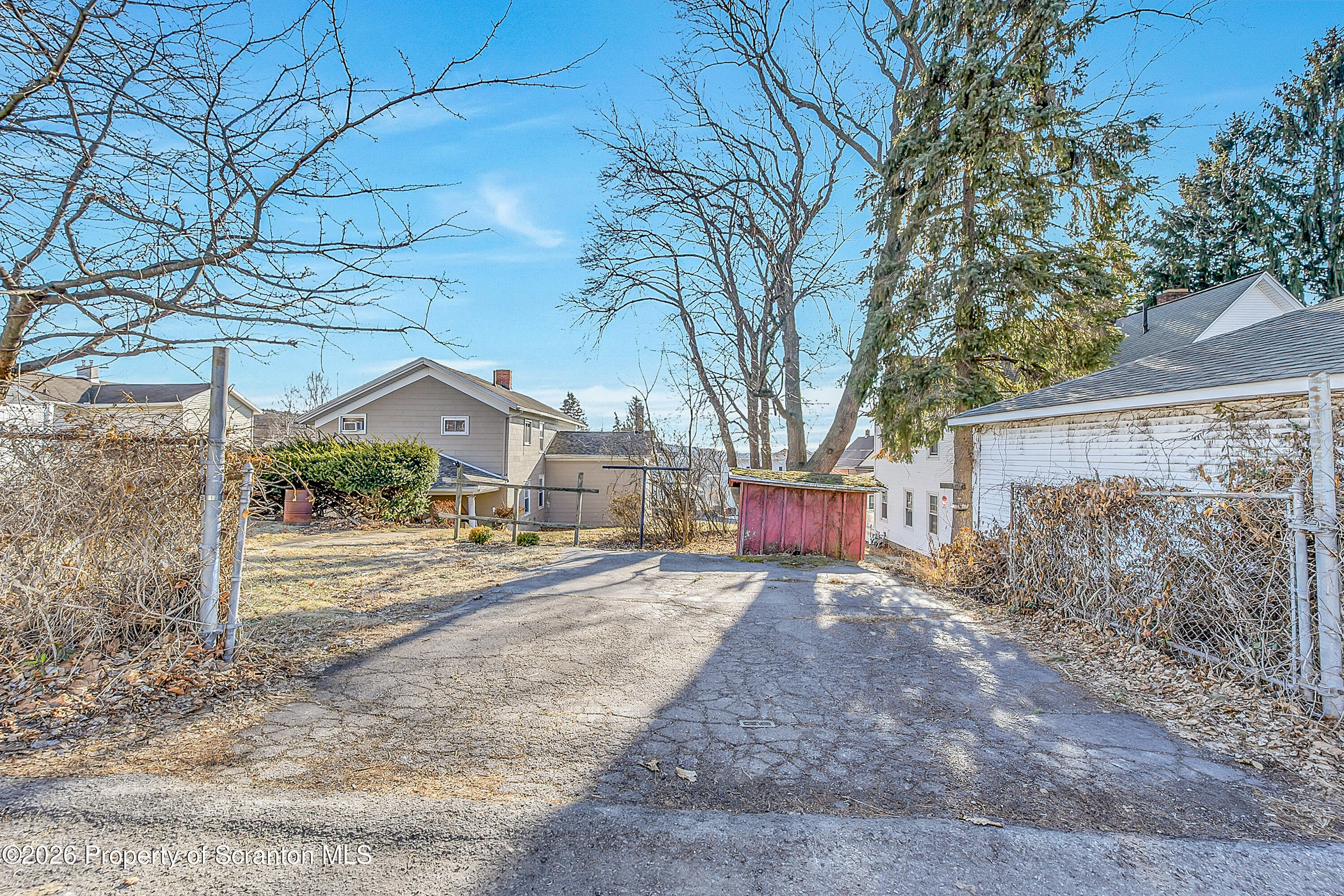 331 Cherry Street, Unit A Dunmore, PA 18512 - Photo 2 of 18 a view of road and with trees