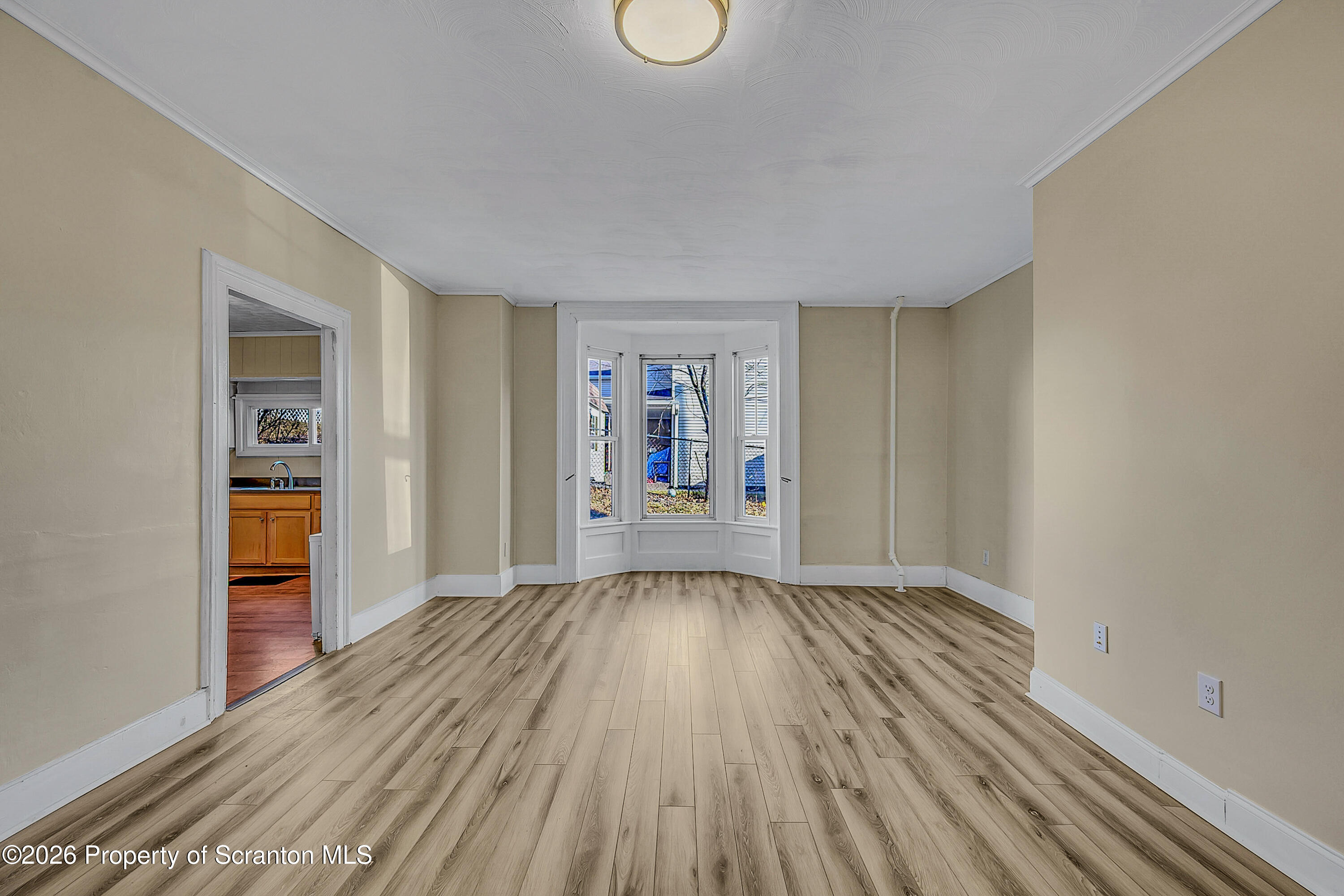 331 Cherry Street, Unit A Dunmore, PA 18512 - Photo 10 of 18 an empty room with wooden floor and closet