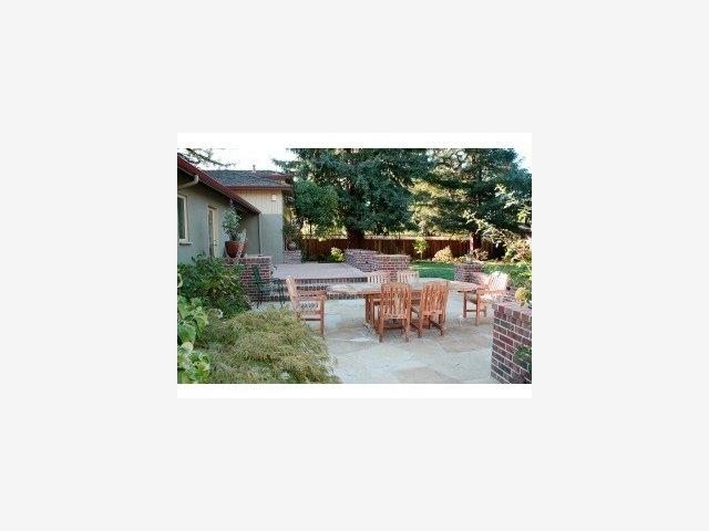 31 Rittenhouse Avenue Atherton, CA 94027 - Photo 8 of 9 a balcony with chairs and a table