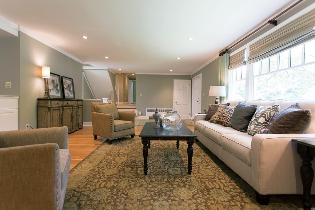 63 Suffolk Road Wellesley, MA 02481 - Photo 5 of 24 a living room with furniture wooden floor and a large window