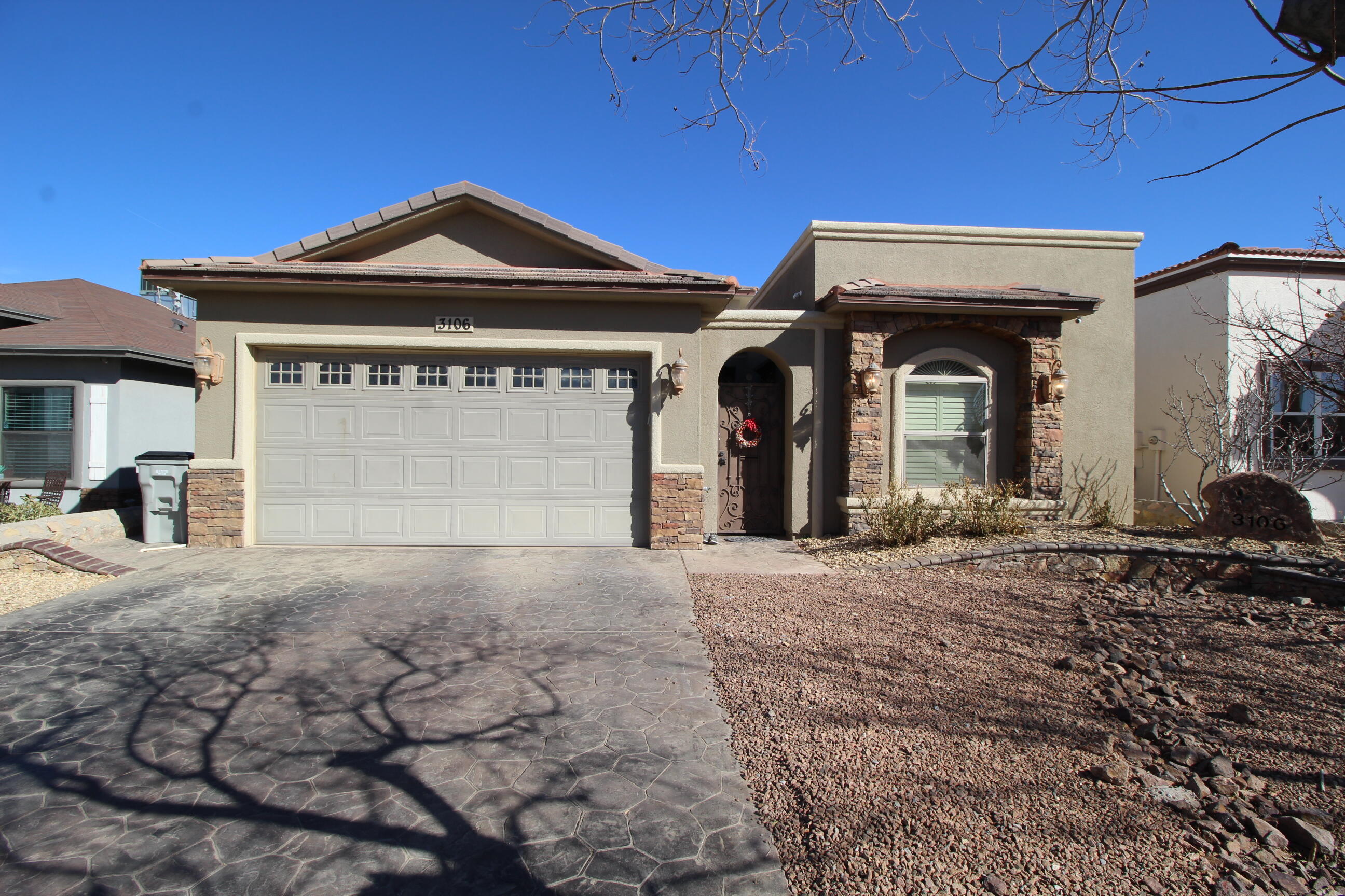 3106 Rustic River Place El Paso, TX 79938 - Photo 1 of 1 a front view of a house with a yard