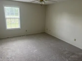 an empty room with a window