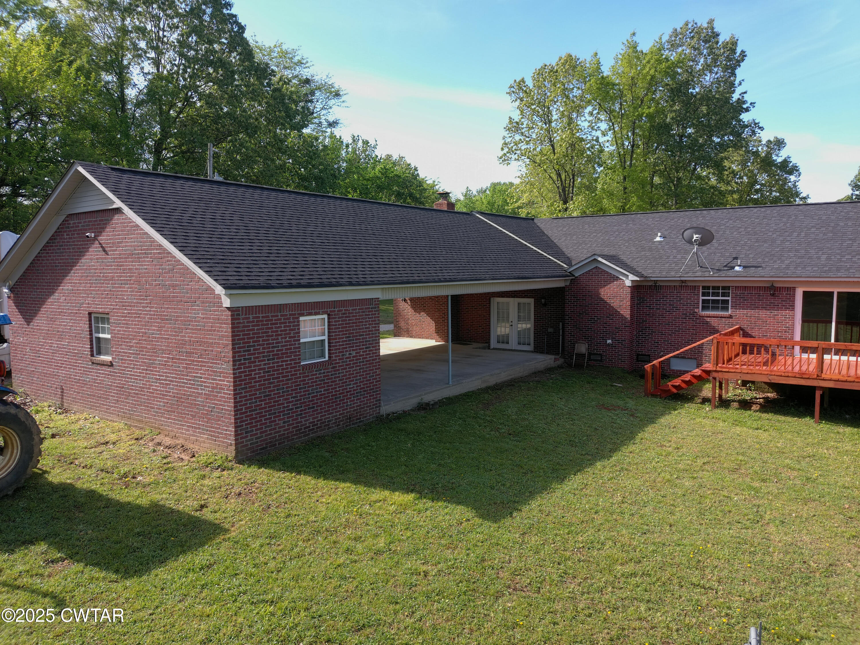 330 Archibald Road Stanton, TN 38069 - Photo 3 of 22 a front view of a house with garden