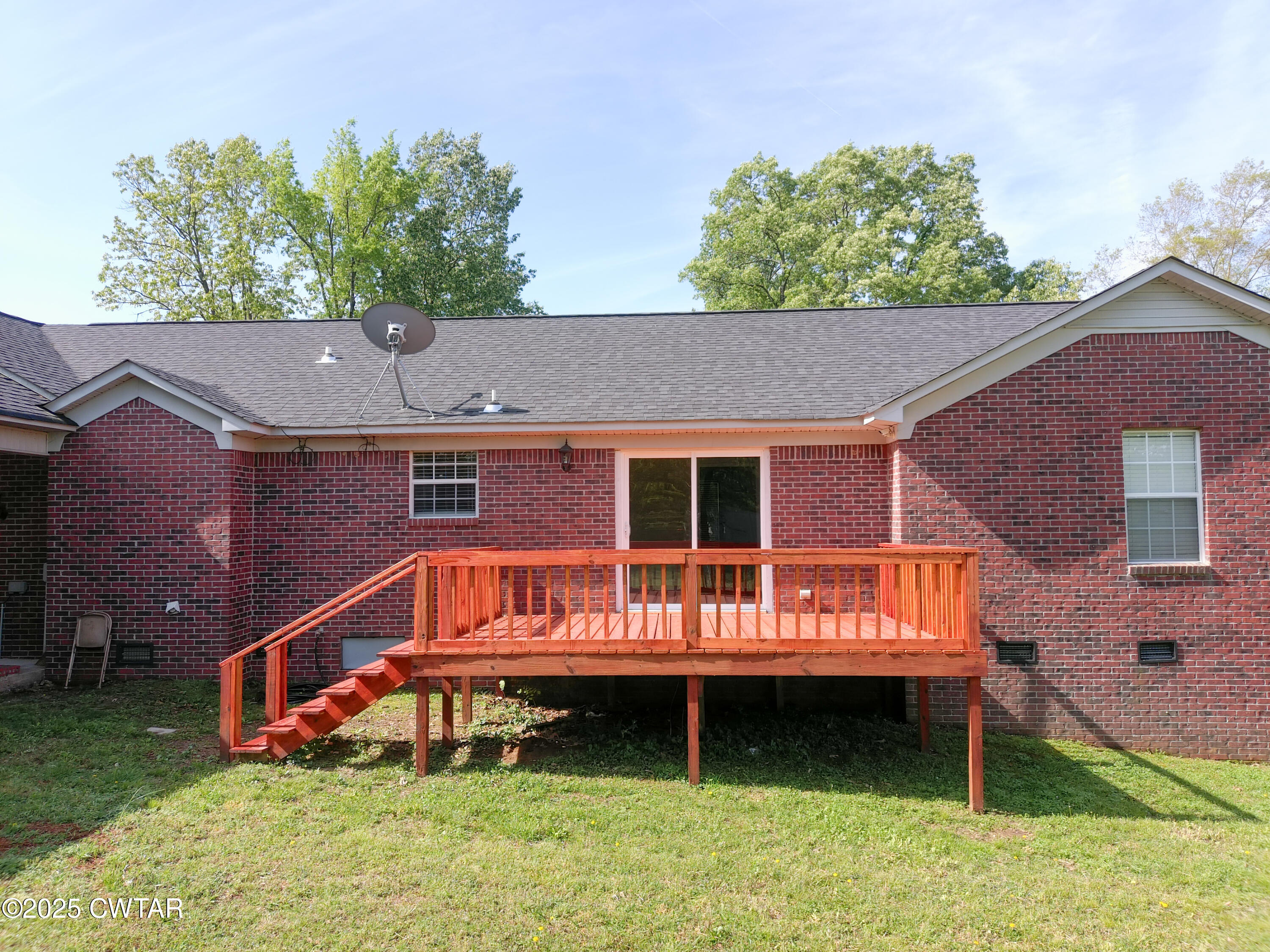 330 Archibald Road Stanton, TN 38069 - Photo 4 of 22 a front view of house with yard and outdoor seating