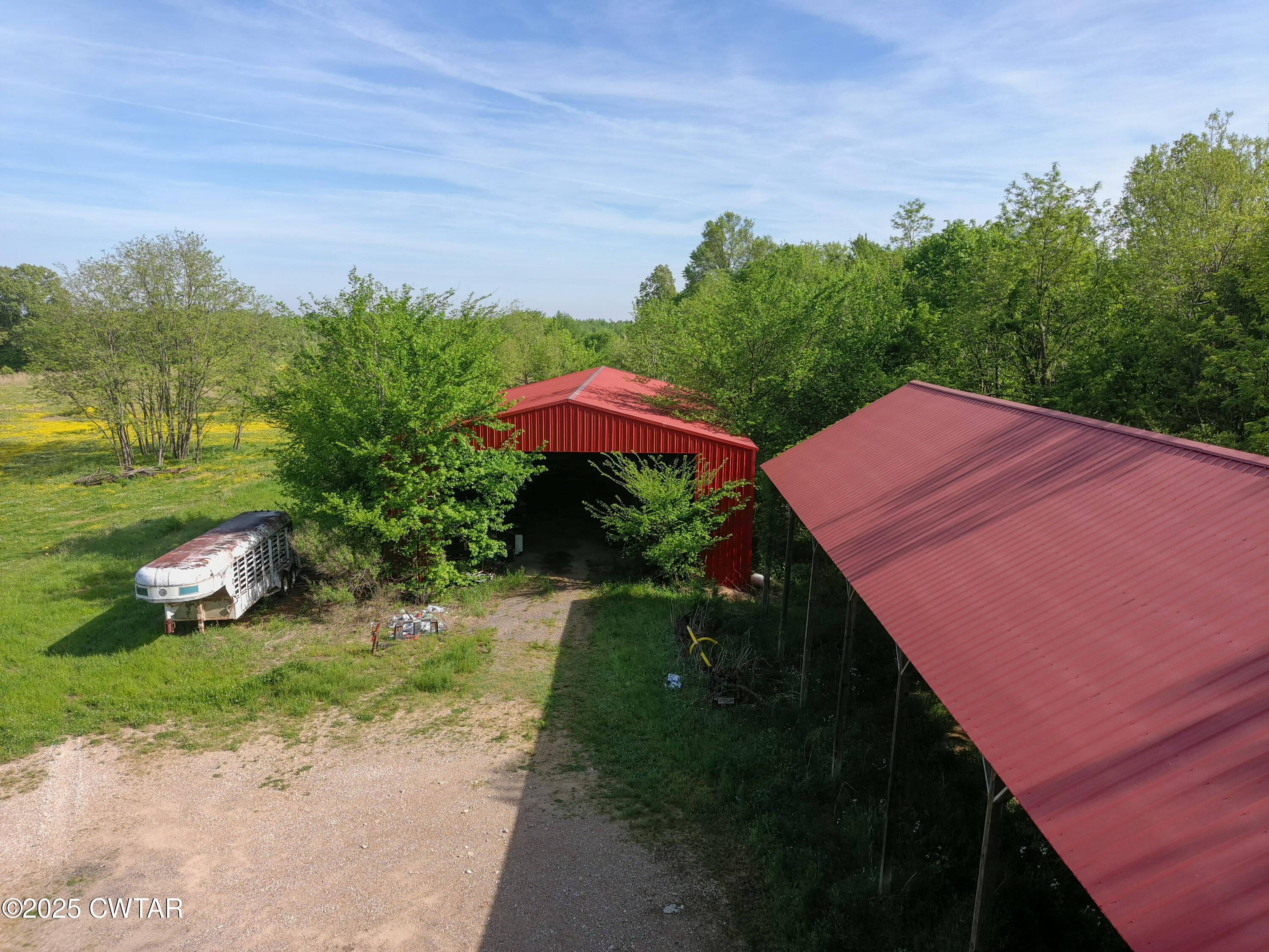 330 Archibald Road Stanton, TN 38069 - Photo 6 of 22 a view of a yard with an outdoor space