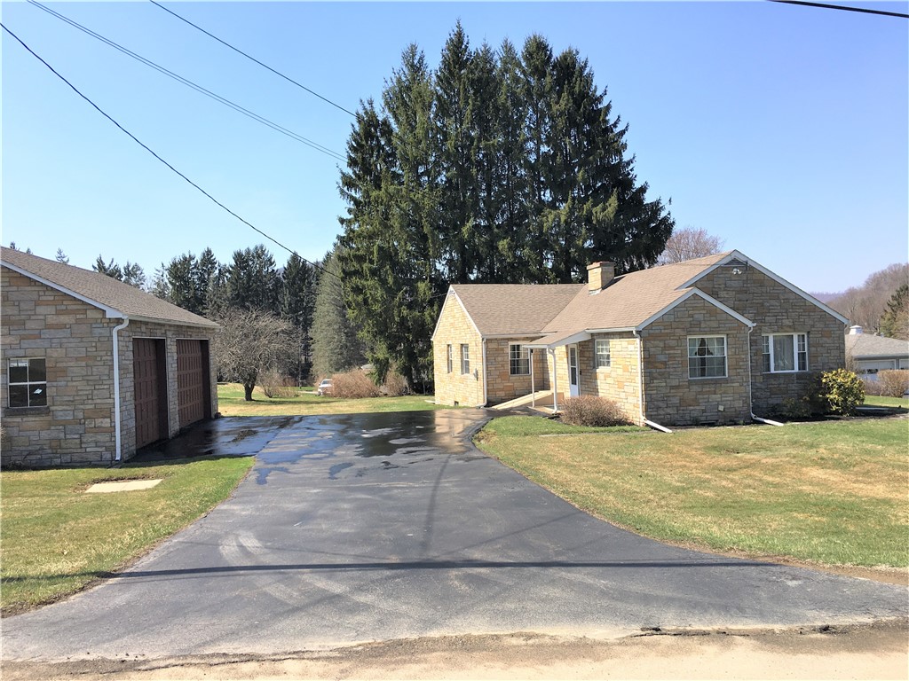 12 South 4th Street Bradford, PA 16701 - Photo 2 of 15 Paved Driveway with 3 stall garage & loads of park
