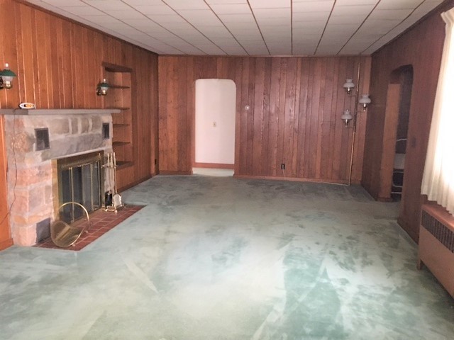 12 South 4th Street Bradford, PA 16701 - Photo 6 of 15 Large living room complimented by beautiful archwa