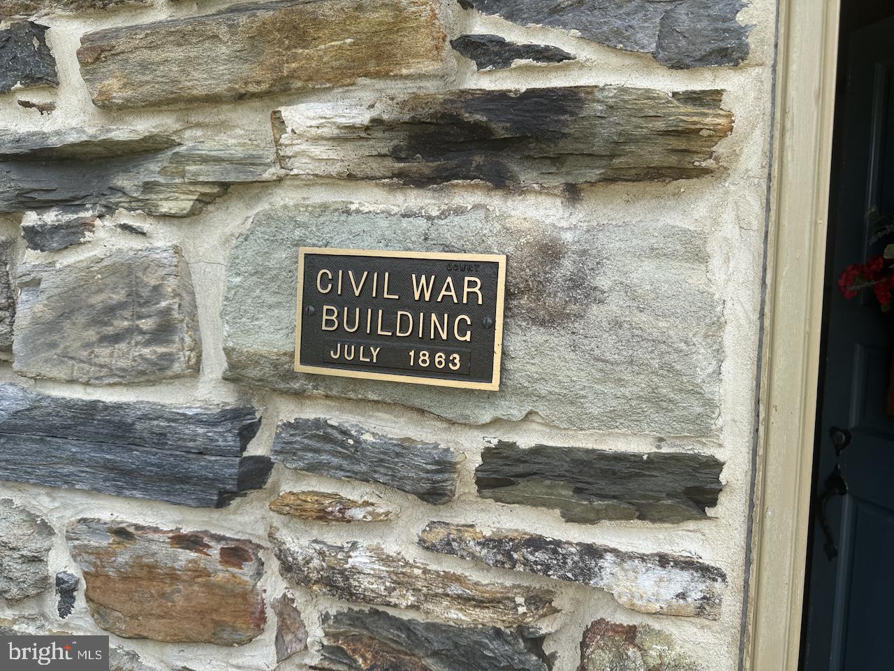 262 Orrtanna Road Orrtanna, PA 17353 - Photo 2 of 43 a sign that is sitting on a brick wall