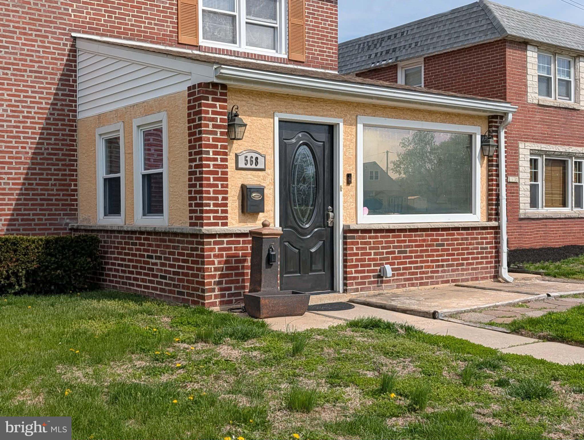 568 Michell Street Ridley Park, PA 19078 - Photo 2 of 41 Charming brick facade with modern entry.