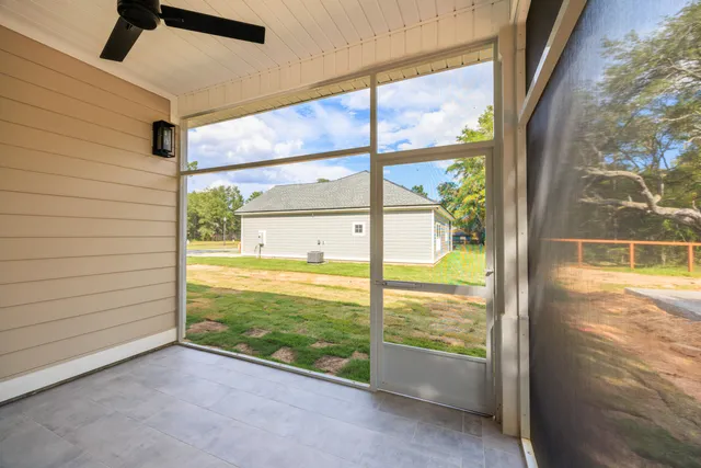 a view of an empty room and window