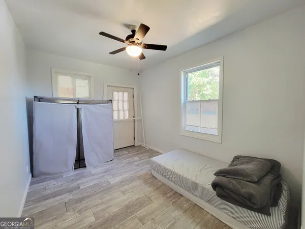 a living room with furniture and a window
