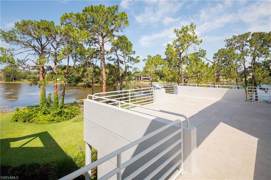 427 Ridge Court Naples, FL 34108 - Photo 25 of 49 a view of a yard with an outdoor space