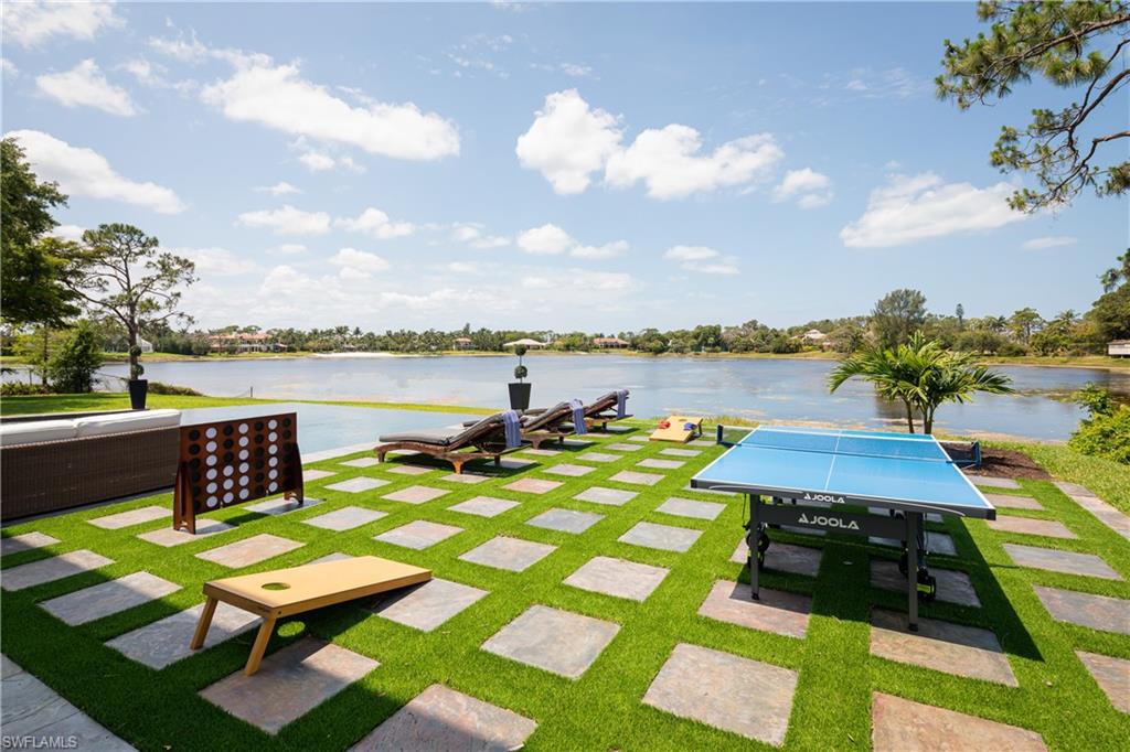427 Ridge Court Naples, FL 34108 - Photo 40 of 49 a view of a ocean with outside seating space