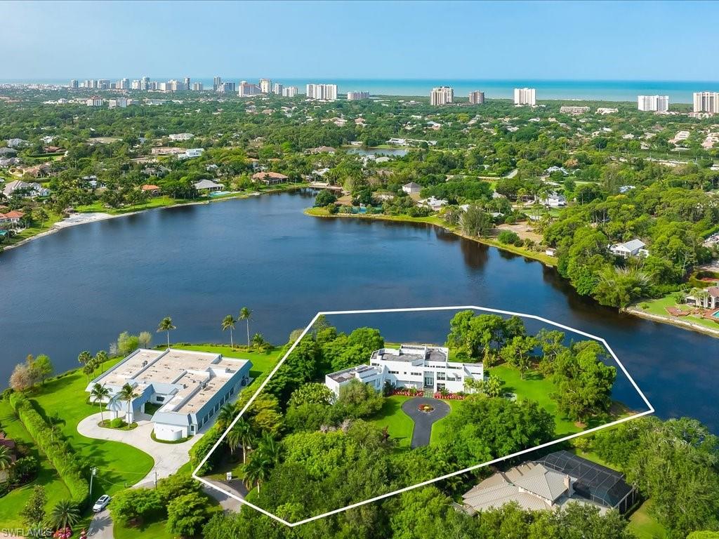 427 Ridge Court Naples, FL 34108 - Photo 49 of 49 an aerial view of a house with a yard