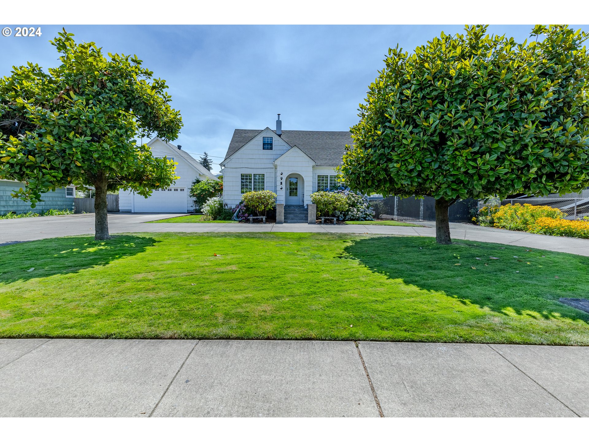3923 Jasper Road Springfield, OR 97478 - Photo 1 of 48 a view of a backyard with a garden