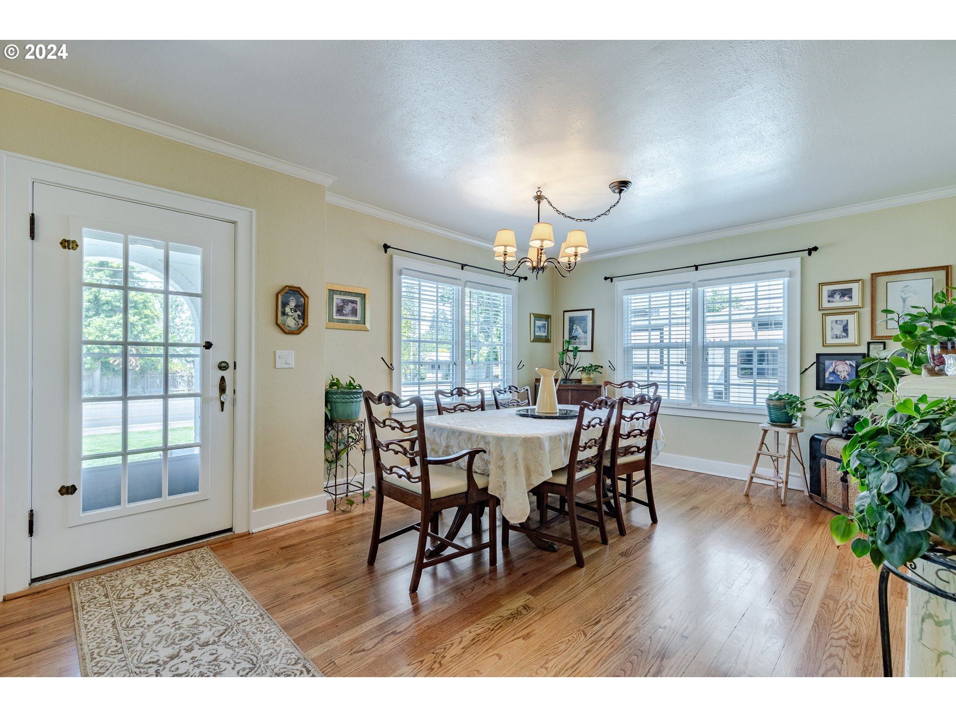 3923 Jasper Road Springfield, OR 97478 - Photo 10 of 48 a view of a dining room with furniture and wooden floor