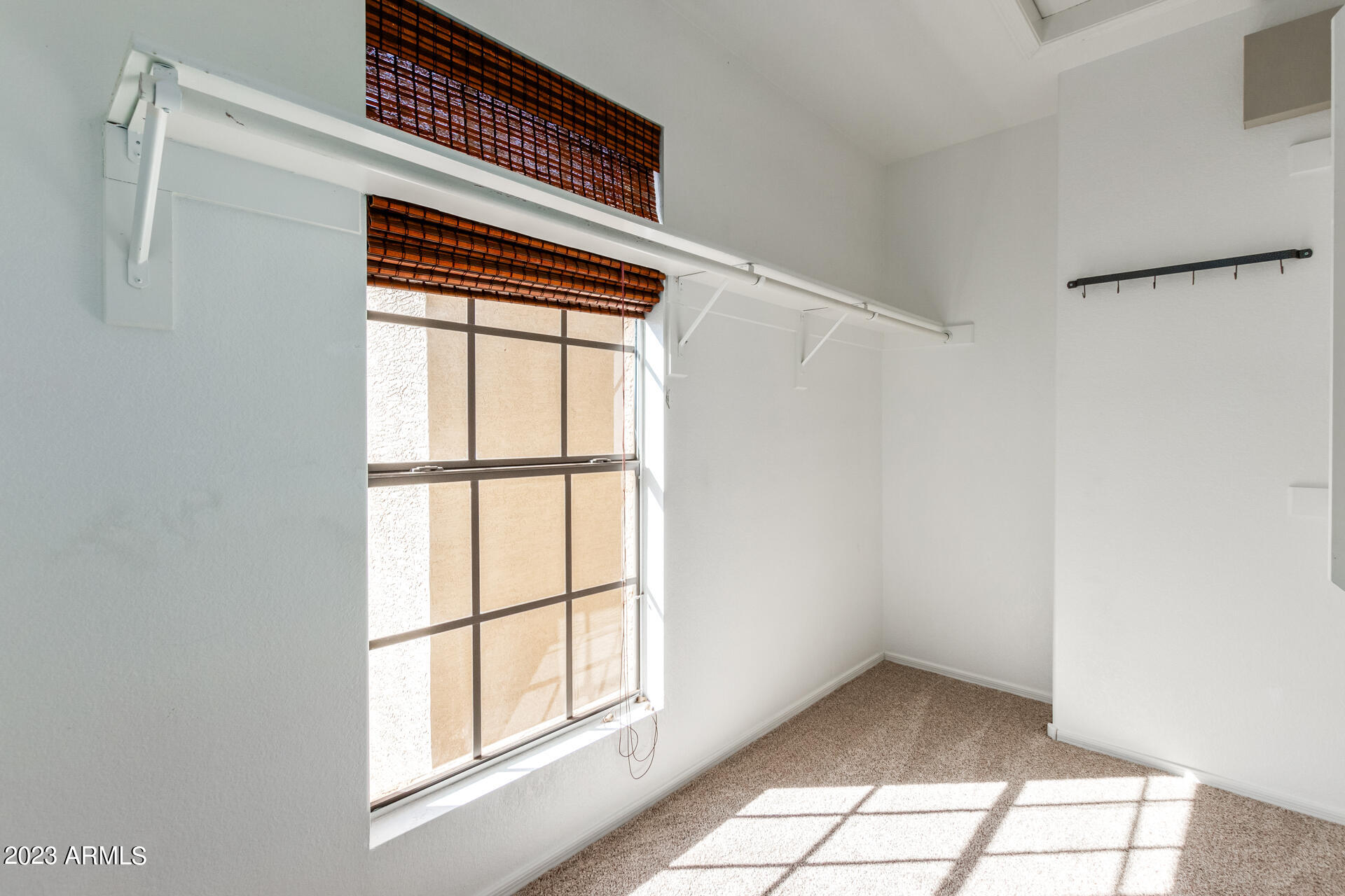 4266 East Agave Road Phoenix, AZ 85044 - Photo 21 of 54 a view of empty room with windows