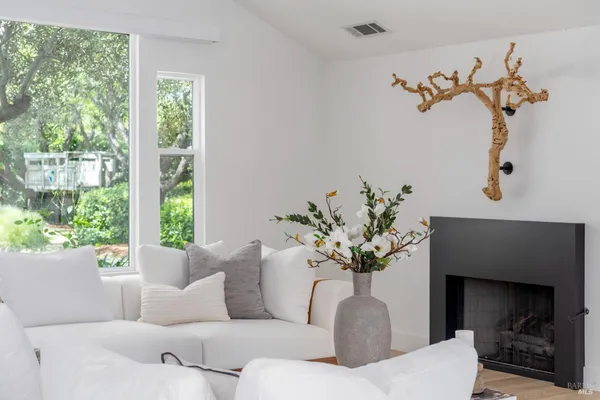 a view of a livingroom with furniture and window