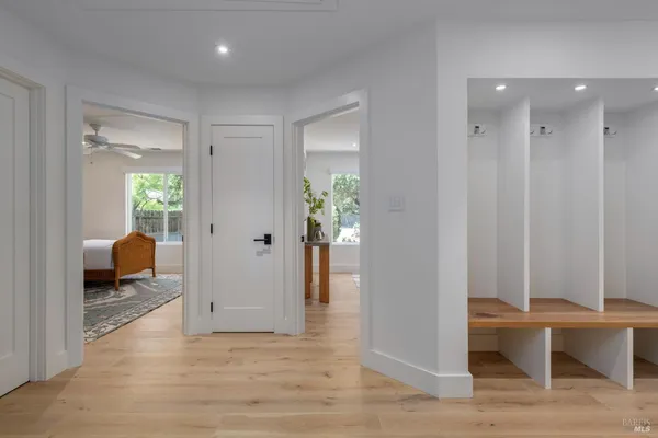 a bathroom with a double vanity sink mirror and