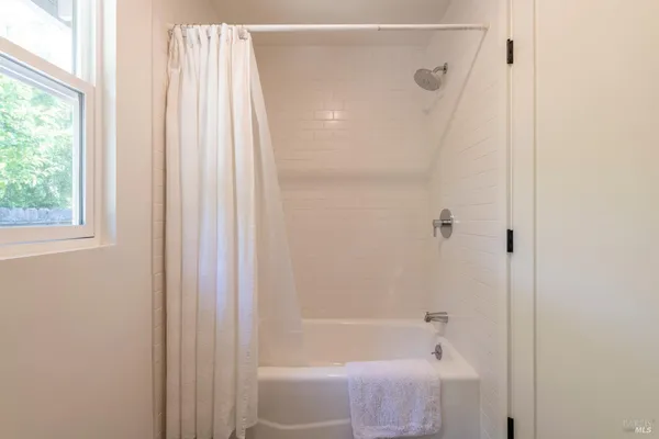 a bathroom with a sink a vanity and mirror