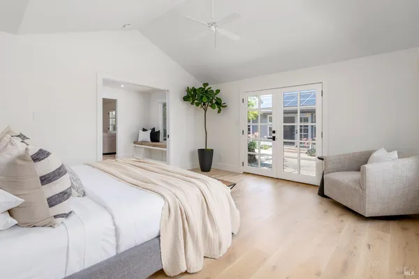 a view of a backyard with swimming pool