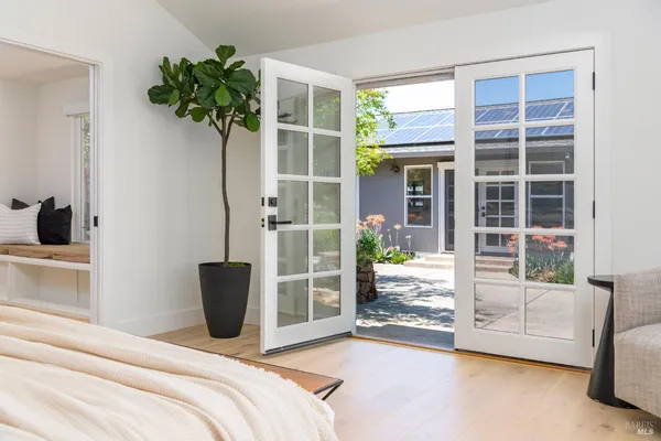a view of backyard with sitting area