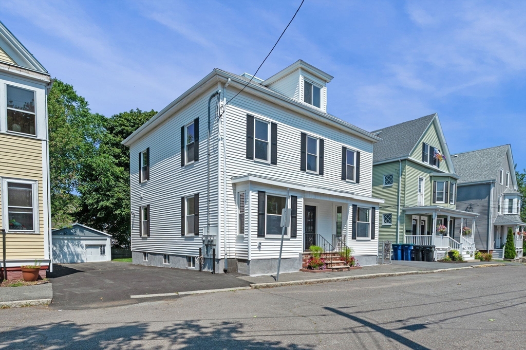 8 Cushing Street, Unit 1 Salem, MA 01970 - Photo 20 of 35 a front view of a building with street view
