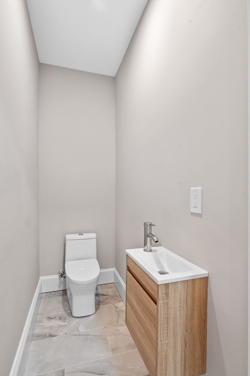 8 Cushing Street, Unit 1 Salem, MA 01970 - Photo 33 of 35 a bathroom with a sink and a toilet