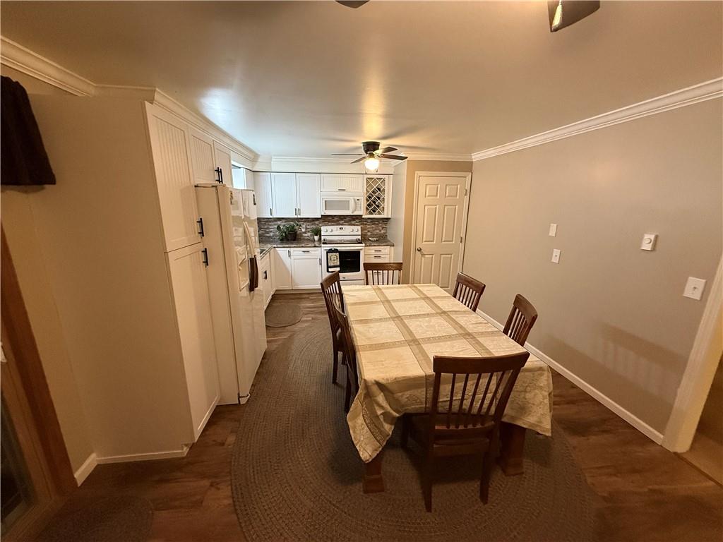 1637 Highway 981 Ruffs Dale, PA 15679 - Photo 4 of 11 a dining room with furniture and a window