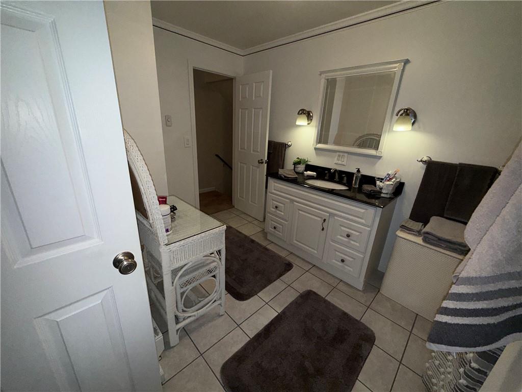 1637 Highway 981 Ruffs Dale, PA 15679 - Photo 8 of 11 a kitchen with a stove and a refrigerator