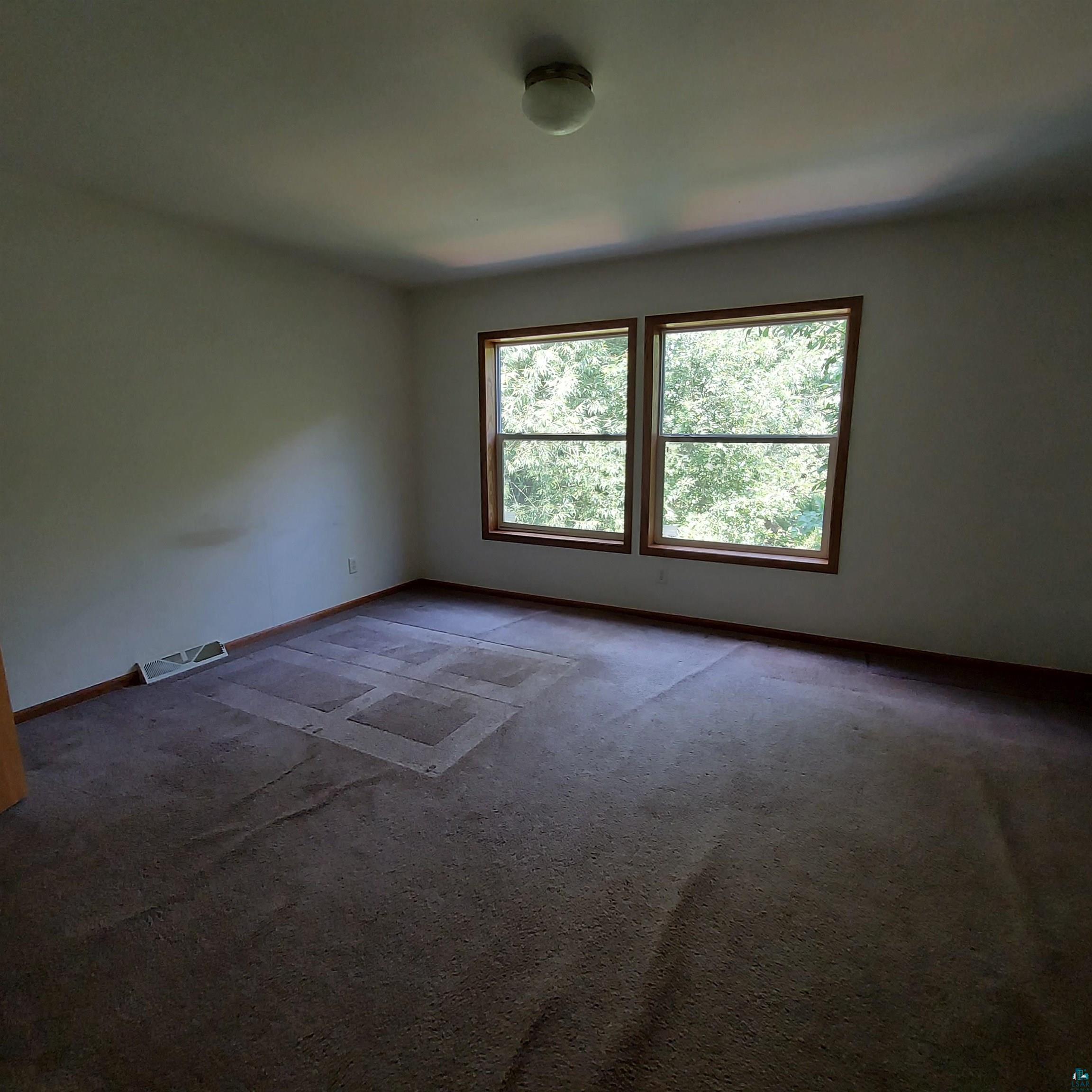 6563 Seville Road Saginaw, MN 55779 - Photo 20 of 28 Empty room with carpet floors