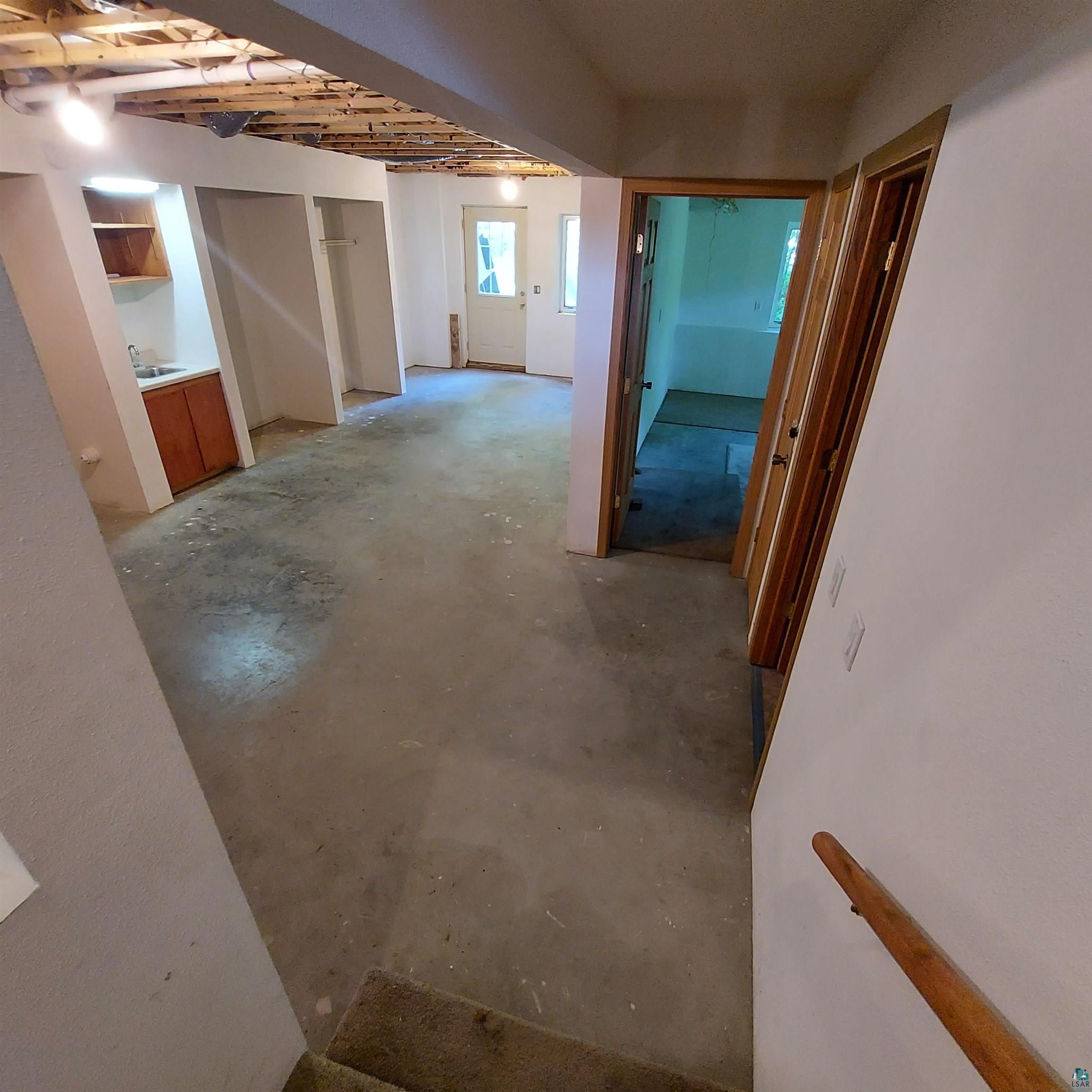 6563 Seville Road Saginaw, MN 55779 - Photo 25 of 28 Corridor with sink