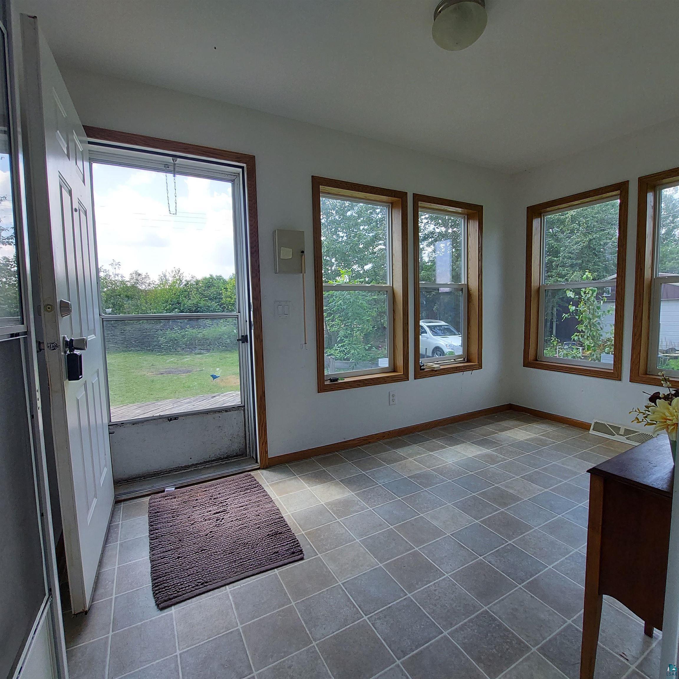 6563 Seville Road Saginaw, MN 55779 - Photo 6 of 28 Doorway featuring tile patterned floors