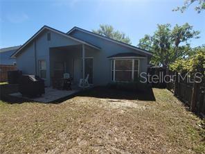 1664 Portsmouth Lake Drive Brandon, FL 33511 - Photo 35 of 38 a view of house with yard