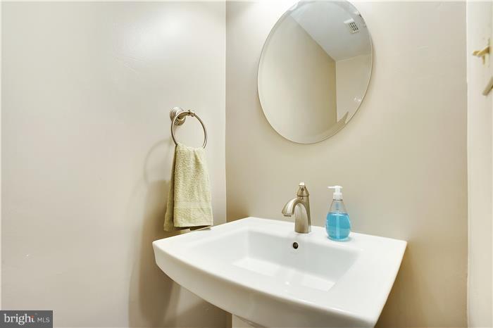 11056 Saffold Way Reston, VA 20190 - Photo 6 of 27 Main Level Powder Room in Foyer