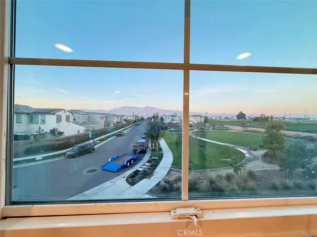 a view of a balcony with city view