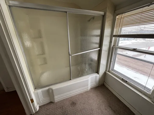 a bathroom with a bathtub