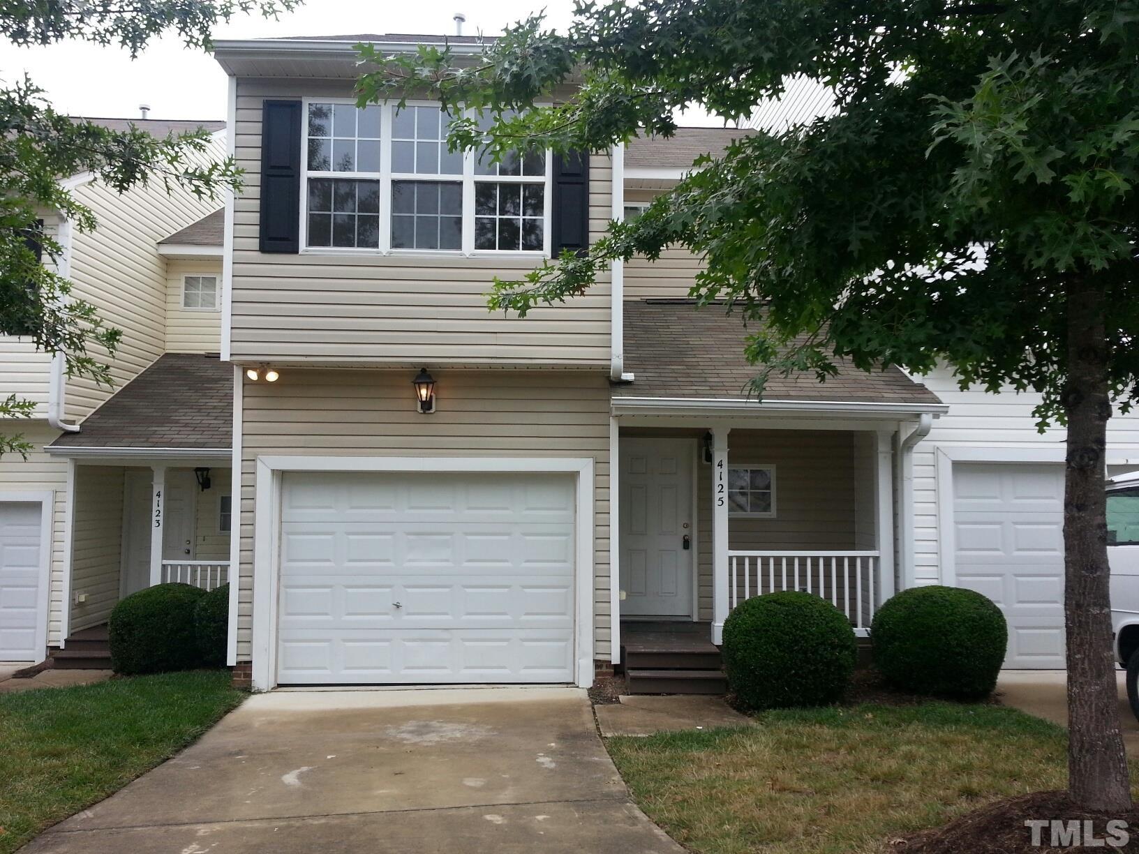 4125 Standing Rock Way Raleigh, NC 27604 - Photo 1 of 11 a view of a house with a yard