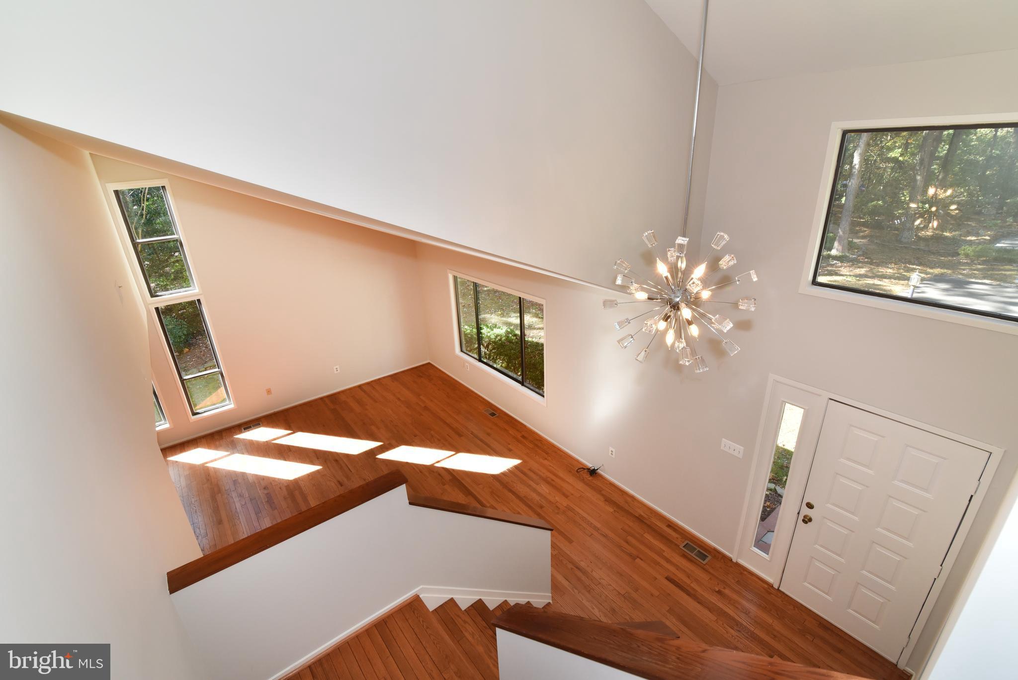 11117 Glade Drive Reston, VA 20191 - Photo 21 of 75 Front foyer with new chandelier & atrium window.