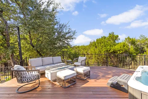 a view of a patio with a table chairs and a patio