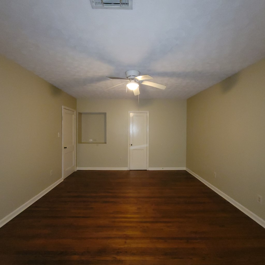 1547 38th Street Columbus, GA 31904 - Photo 15 of 24 a view of an empty room with wooden floor